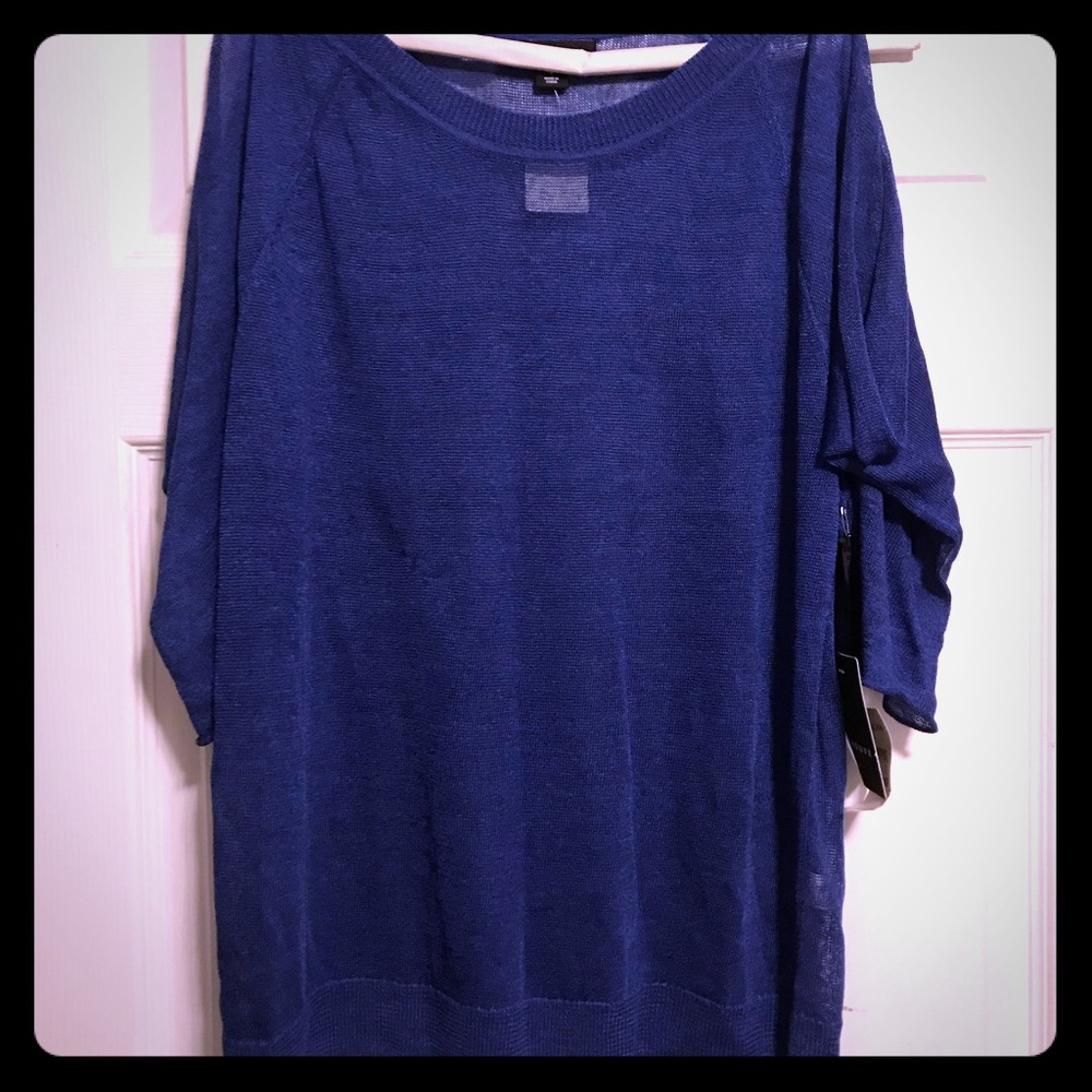 Shoulder cut out top.